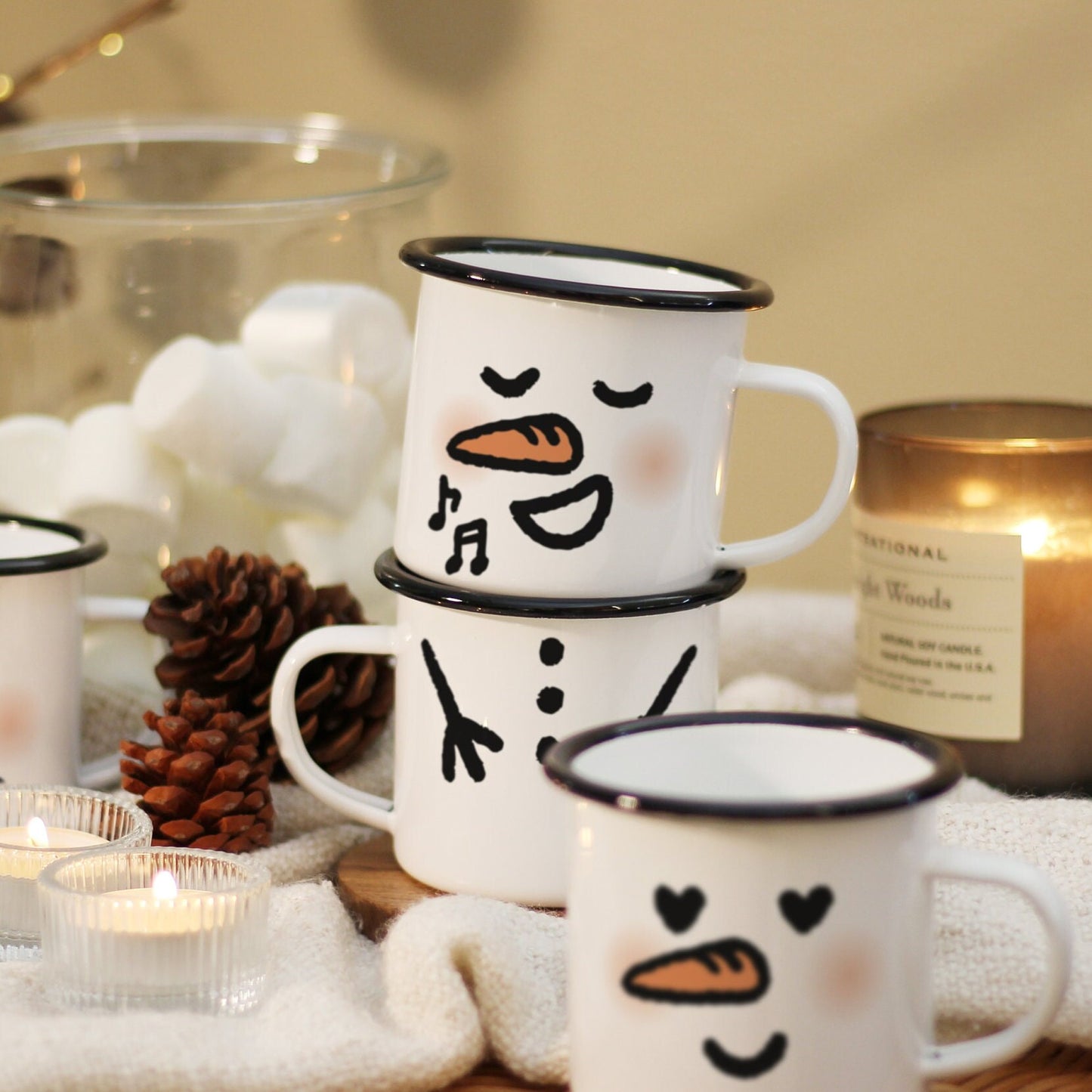 A singing snowman mug is stacked on top of a body. A snowman mug has a snowman face on the right side and its snowman body on the left side. So you can stack up a two mug to build a snowman!